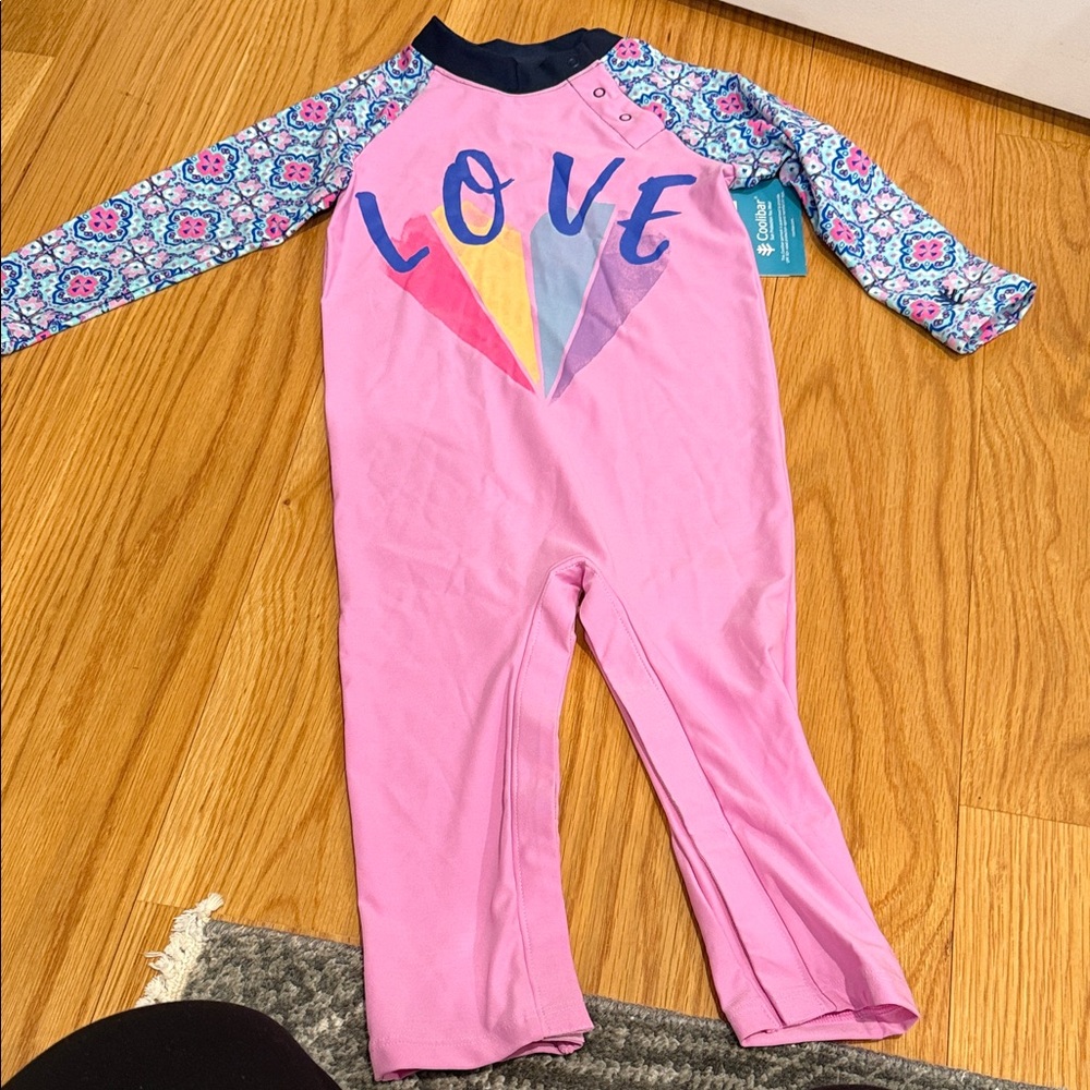 Coolibar Pink Rashguard with Blue Floral Sleeves